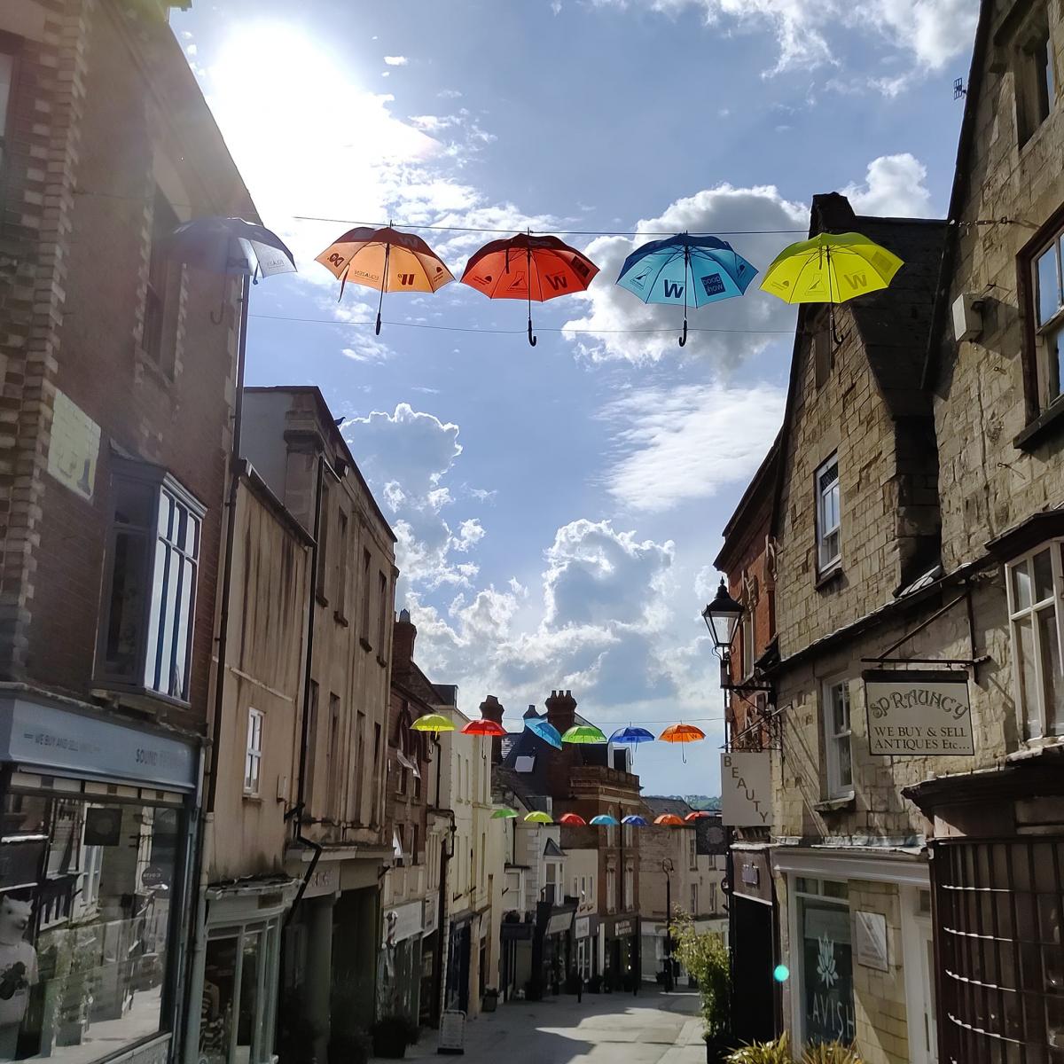 Umbrellas over Stroud High Street SNJ June 2021 - enlarge
